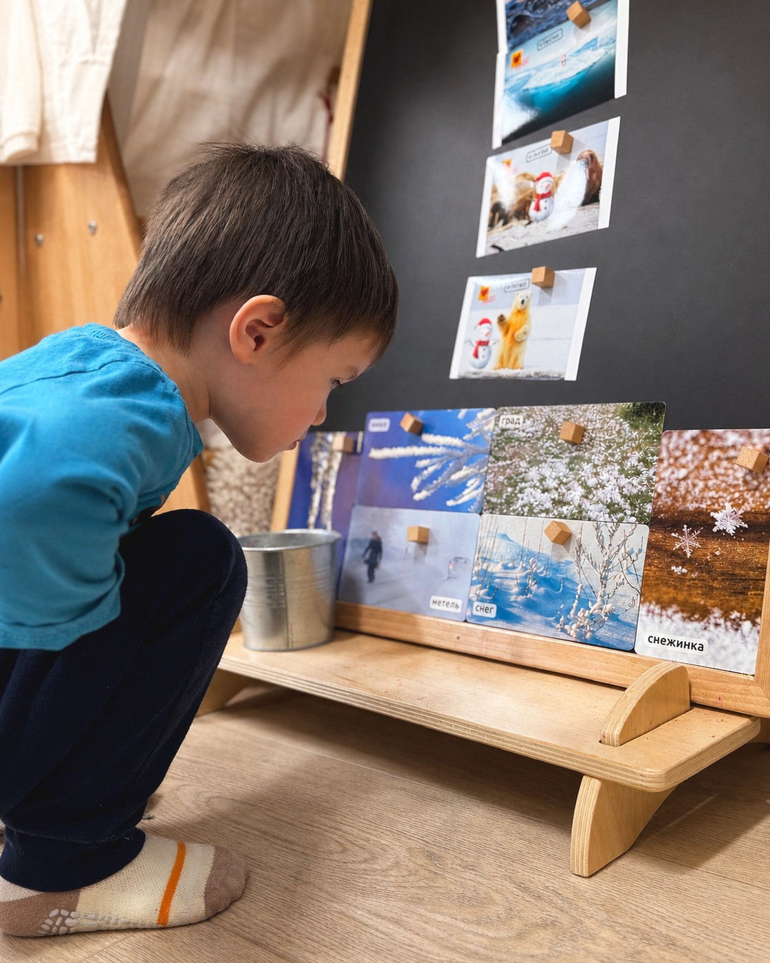 A child studying winter clues during a snowman mystery