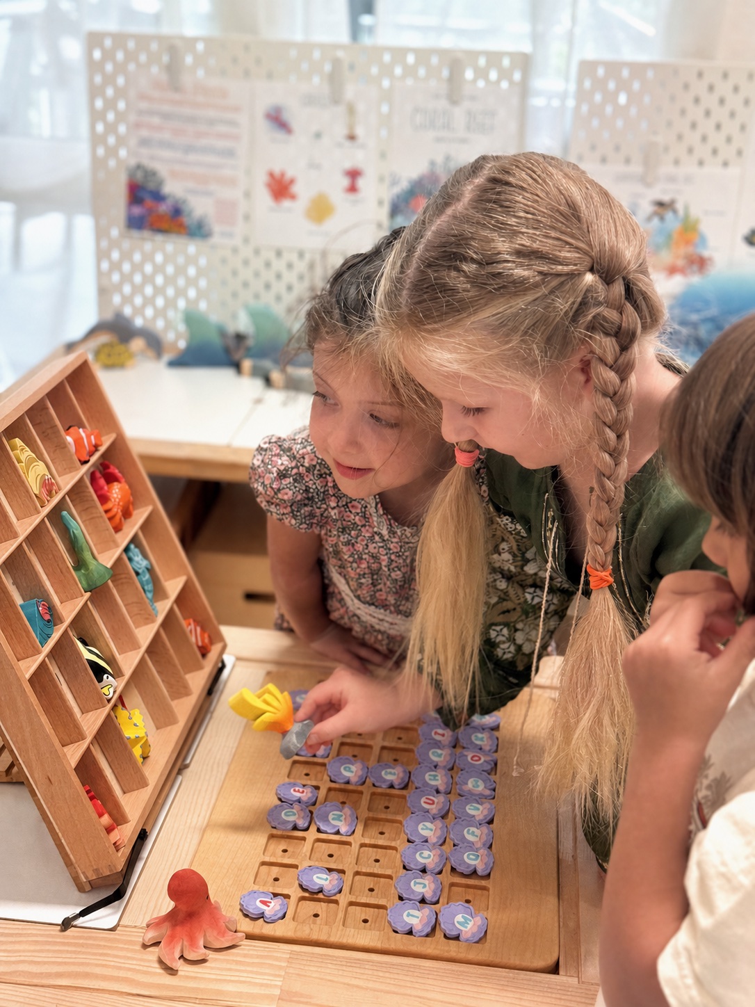 Children matching letter pieces during Phonics and Early Reading