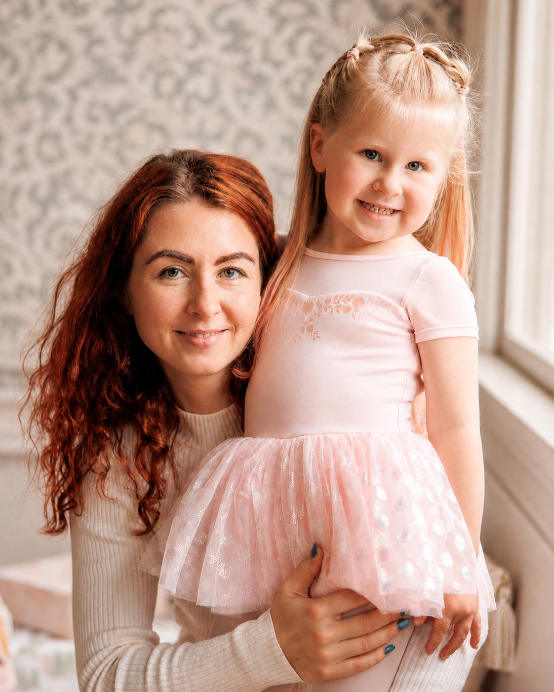 Kseniia, Founder and Program Director of Foxville Kids, with her daughter