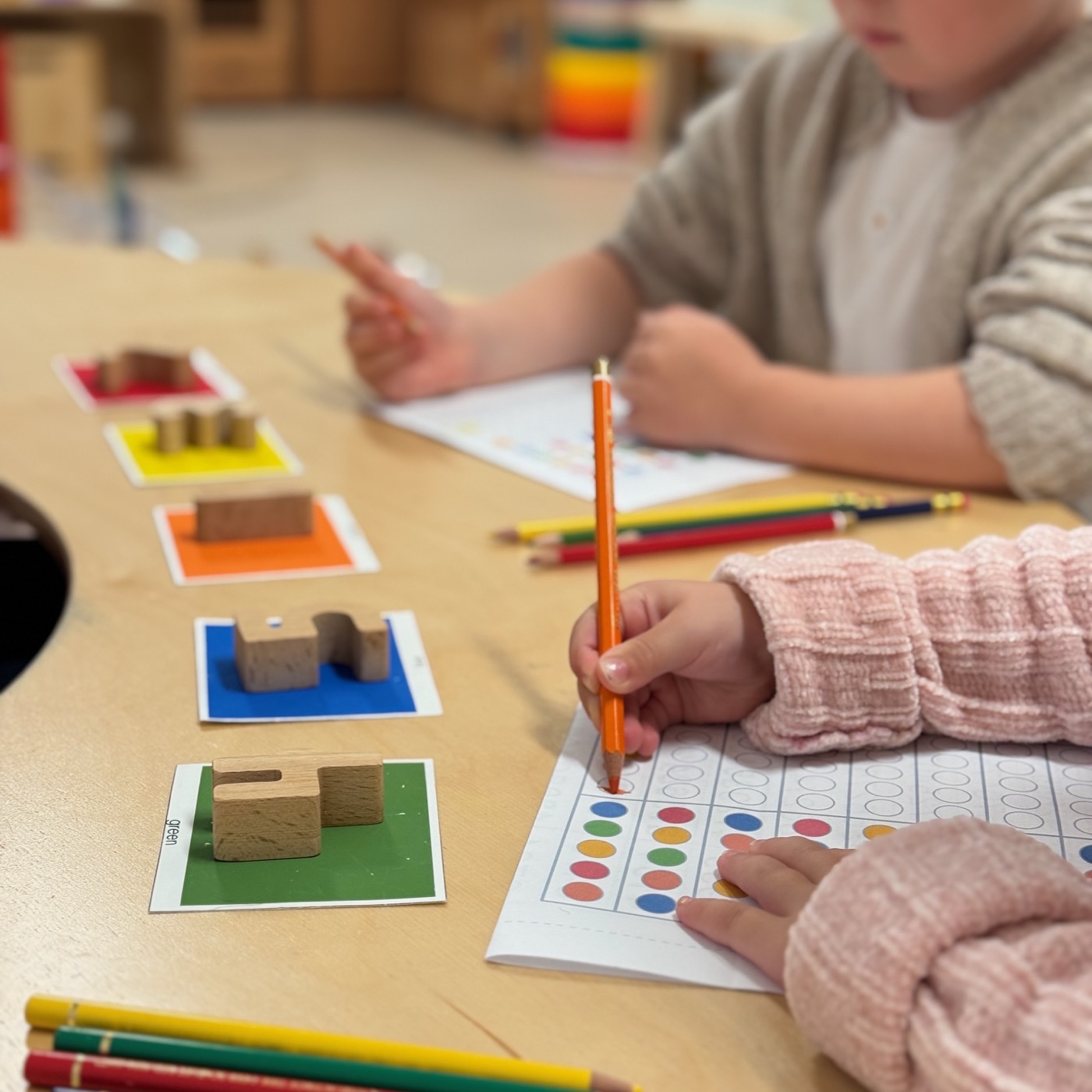 Children developing early mathematics skills through a hands-on classroom activity