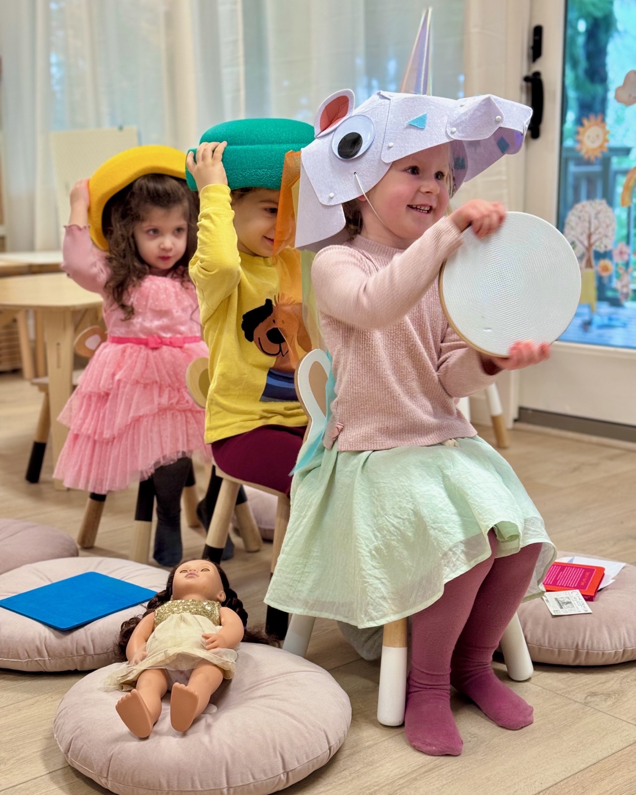 Children enjoying imaginative dramatic play in the preschool classroom